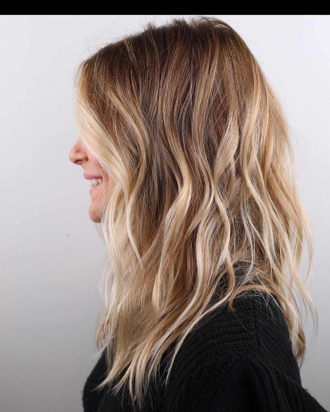 A full head of dimensional highlights by Johnny Ramirez — foiled, glossed, and revealed.